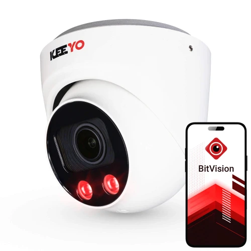 Biała kamera kopułowa z czarnym obiektywem i dwoma czerwonymi diodami LED na przodzie. Obok kamery znajduje się smartfon z aplikacją BitVision na ekranie.