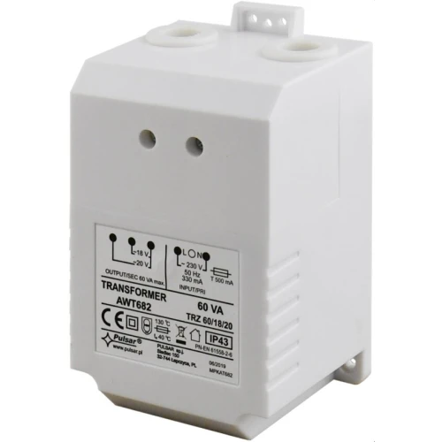 Na zdjęciu znajduje się biały transformator AWT682 marki Pulsar, z widocznymi oznaczeniami technicznymi na przedniej części obudowy. Urządzenie posiada dwa otwory montażowe na górze oraz specyfikacje dotyczące napięcia i mocy.