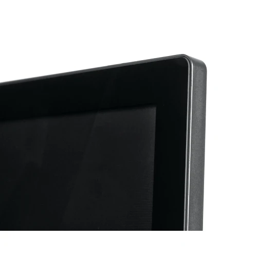 Zbliżenie na krawędź ekranu wideodomofonu z czarną ramką i metalicznym wykończeniem. Ekran jest wyłączony, co podkreśla jego gładką powierzchnię.