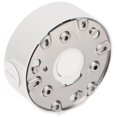 Okrągła, biała obudowa montażowa z metalowym spodem i kilkoma otworami na śruby. Widoczny jest boczny otwór na przewody oraz centralne miejsce na mocowanie.