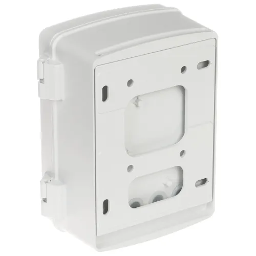 Biała, prostokątna obudowa z tworzywa sztucznego z widocznymi otworami montażowymi i zaokrąglonymi krawędziami. Widok od strony mocowania do ściany z detalami konstrukcyjnymi.