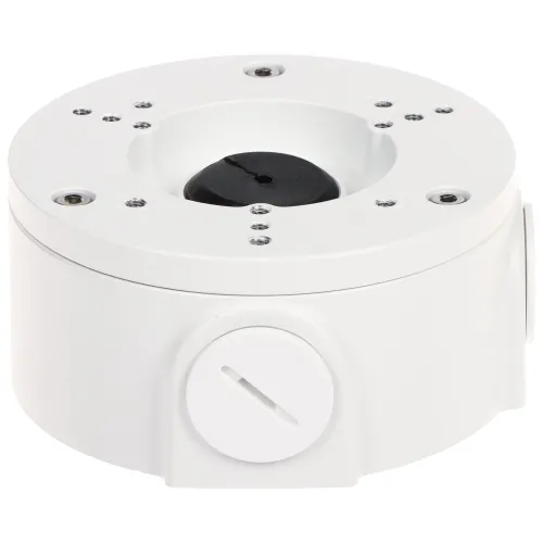 Biała, okrągła puszka montażowa z kilkoma otworami na śruby i zaślepką na boku. Puszka ma gładką powierzchnię i jest przeznaczona do instalacji kamer lub innych urządzeń.