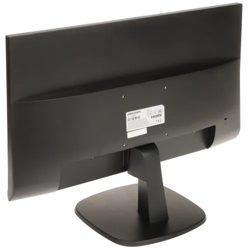 Na zdjęciu widoczny jest tył czarnego monitora komputerowego z prostokątną podstawą i centralnie umieszczonym uchwytem. Na tylnej obudowie monitora znajduje się etykieta z informacjami technicznymi.