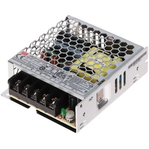 Zasilacz impulsowy LRS-50-12 Mean Well z metalową obudową o strukturze plastra miodu. Widoczne są złącza i elementy elektroniczne na płytce drukowanej.