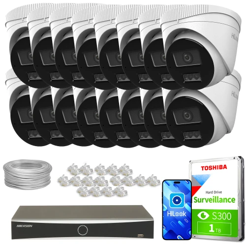 Na zdjęciu znajduje się zestaw do monitoringu, który obejmuje szesnaście kamer, rejestrator, dysk twardy Toshiba o pojemności 1TB oraz akcesoria montażowe. Kamery są białe, a rejestrator i dysk są oznaczone markami HiLook i Toshiba.