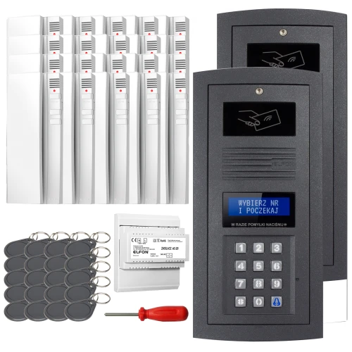 Zestaw domofonowy cyfrowy składający się z panelu z klawiaturą numeryczną, breloków zbliżeniowych, śrubokręta oraz modułu elektronicznego. W tle widoczne są białe obudowy, prawdopodobnie przeznaczone do montażu wewnętrznego.